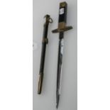 A scarce French Airforce NCO's dress dagger, and scabbard, with brass furniture, the black/blue grip