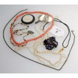 A single row graduated cultured pearl necklace, a twisted coral bead necklace and a small quantity