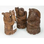 A group of three Chinese rootwood figural carvings, early 20th century, 16cm