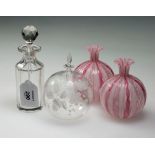 A collection of approximately two dozen cut glass and other dressing table scent bottles and jars,