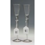 A pair of 1760s style tall open helical air twist wines, with small conical bowls over rough