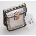 A French 19th century gold mounted and mother of pearl coin purse, modelled as a satchel, with