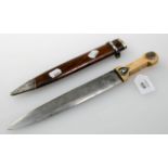 A 19th century Russian Kingal type dagger, and hardwood scabbard, the marine ivory shaped grip