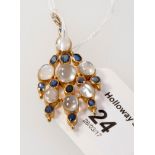 A moonstone and sapphire chandelier style pendant, the graduated oval moonstones and oval cut