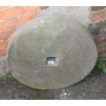 A small pair of cast millstones, 61cm