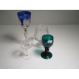 A collection of table glassware, to include cut glass green German rummers, blue cased and cut