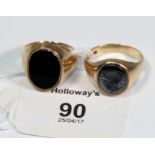 A gentleman's onyx mounted dress ring, and one similar