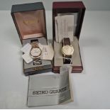 A presentation boxed Seiko quartz gentleman's wrist watch, and one other (2)