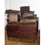 A George III mahogany drop leaf dining table, together with a quantity of period timber back boards,