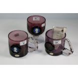 Three pieces of mauve Wedgwood commemorative glass, each set with Jasper plaque