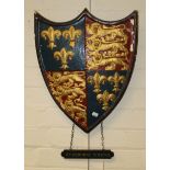 A circa 1930s painted plaster and wood shield, bearing the crest of Sherborne School