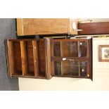 A part 19th century narrow two section glazed bookcase/cupboard, 67cm wide