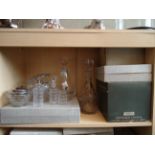 Two clear glass decanters and stoppers, two cased sets of Whitefriars drinking glasses, and other