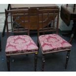 A pair of Heal's of Tottenham Court Road walnut side chairs, with Japanoise style lattice back