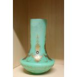 A c1900 French chrysoprase glass vase, of baluster form, with raised gilt oak leaf and beaded swag