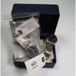 A presentation boxed Seiko 'Solar' titanium (100m) gentleman's wrist watch, together with a black