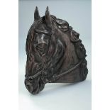 A bronzed clay sculptural study of a stallion's head, bearing monogram PE79, 52cm high