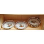A collection of early 20th century Meissen porcelain ribbon plates, each painted with varying scenes
