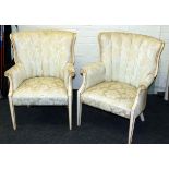 A pair of 18th century style painted and parcel gilt fan back armchairs, with scroll arms and square