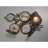 A collection of decorative pocket watches