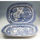 A Victorian blue and white willow pattern oval meat dish, 46cm long, together with one other