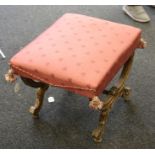 A 19th century giltwood 'X' frame stool, with channelled outlines and turned feet, the overstuffed