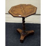 A 19th century figured olive wood occasional table, the inlaid strung quarter veneered octagonal top