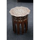 An early 20th century mother of pearl and faux bone inlaid Indo-Moorish occasional table, the