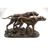 Charles Valton (French 1851-1918), a large brown patinated bronze of two gun dogs on the scent,