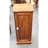 A large Victorian mahogany pot cupboard, the square top with moulded edge above on panel door with