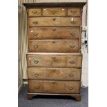 A George I/II walnut chest on chest, the upper section with three short over three long drawers