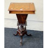 A Victorian walnut sewing table, the rectangular hinged lid specimen wood inlaid with games board