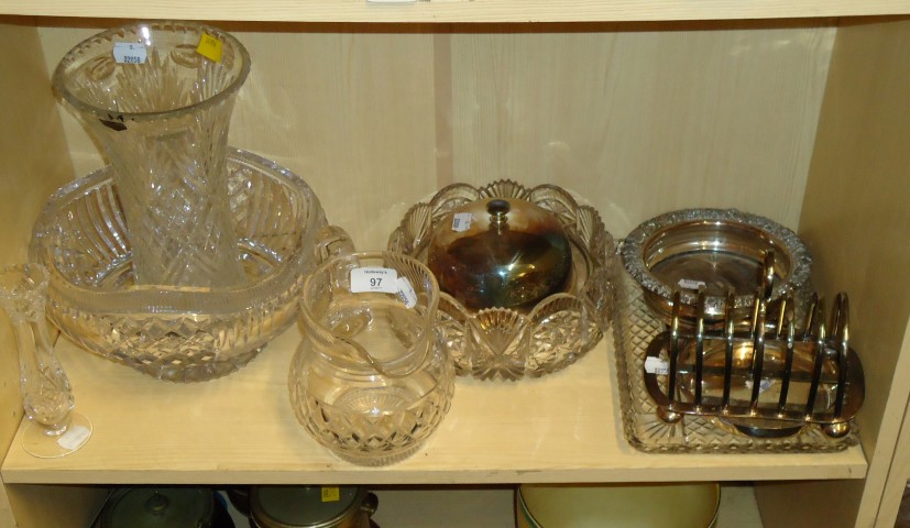 A heavy cut glass pedestal fruit bowl,together with other items of cut glass and silver plated