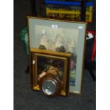 A small circular oak framed barometer, a gilt metal leaf framed wall mirror, an unsigned watercolour