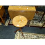 An Edwardian oak Sutherland table, a c1900 mahogany tripod wine table and an oak sewing box