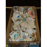 A collection of cigarette and tea vending cards