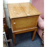 An Edwardian inlaid mahogany rise and fall drinks cabinet, on squares supports, 55cm wide