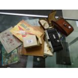 Mixed lot including folding camera, cigarette cards, risque playing cards etc