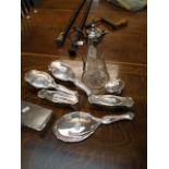 A silver backed five piece mirror and brush set, a silver cigarette box and a silver ring box,