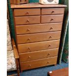 A cherrywood veneered chest