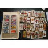 A collection of cigarette cards, including some sets on cricket etc