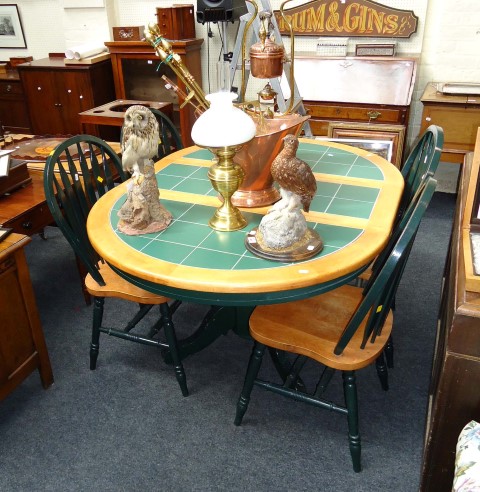 A beech 'D end' extending kitchen extending tile topped pedestal dining table, and a set of four