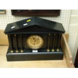 An early 20th century Belgian black marble 8 day mantel clock, of architectural temple form, with