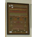 An early 20th century woolwork sampler, woven with alphabet, numbers, deer and trees, named Diana