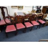 A set of five Victorian mahogany balloon back dining chairs, each with pierced horizontal splat,