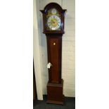 An early 20th century mahogany three-train grandmother clock