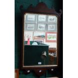 An 18th century style mahogany fret-framed wall mirror, with giltwood slip and bevelled