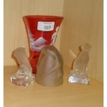 A cranberry 'Mary Gregory' hyacinth vase, two Nachtmann frosted glass model and a frosted glass '