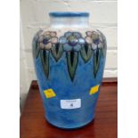 A 1920s Royal Doulton art pottery vase, with simple scraffito decoration on a blue ground, bearing
