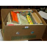 A box containing hardback volumes, Giles cartoons, etc